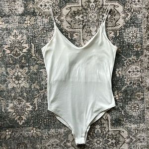 Basic white bodysuit.